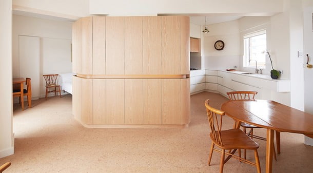 The centrepiece of this refurbished apartment is the custom joinery, which is not only elegant but performs three practical functions: it visually divides the space, provides ample storage and, due to the in-built handrail, makes the unit accessible for all potential residents. 
